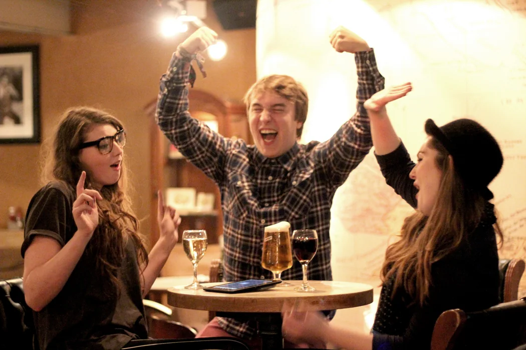 Quiz players celebrating a correct answer